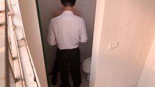 two handsome colleagues have sex in the toilet