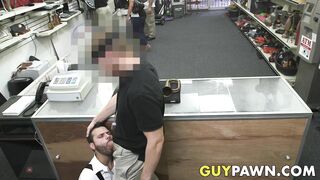 hunky pawnbroker banging customer in the back room