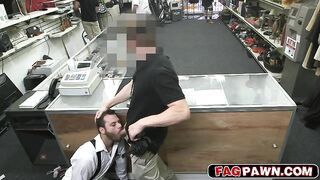 dude sucks dick behind a counter while other customers shop