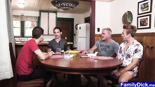 young stepson enjoying breakfast with his full family