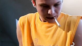 young stone likes to smoke while reading porn while wanking